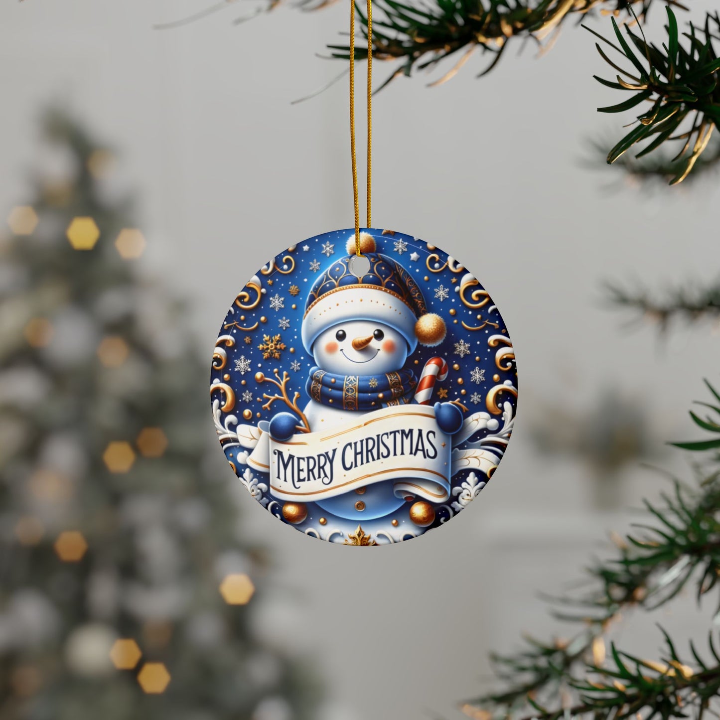 Merry Christmas Snowman ceramic ornament hanging from a pine tree branch with Christmas lights