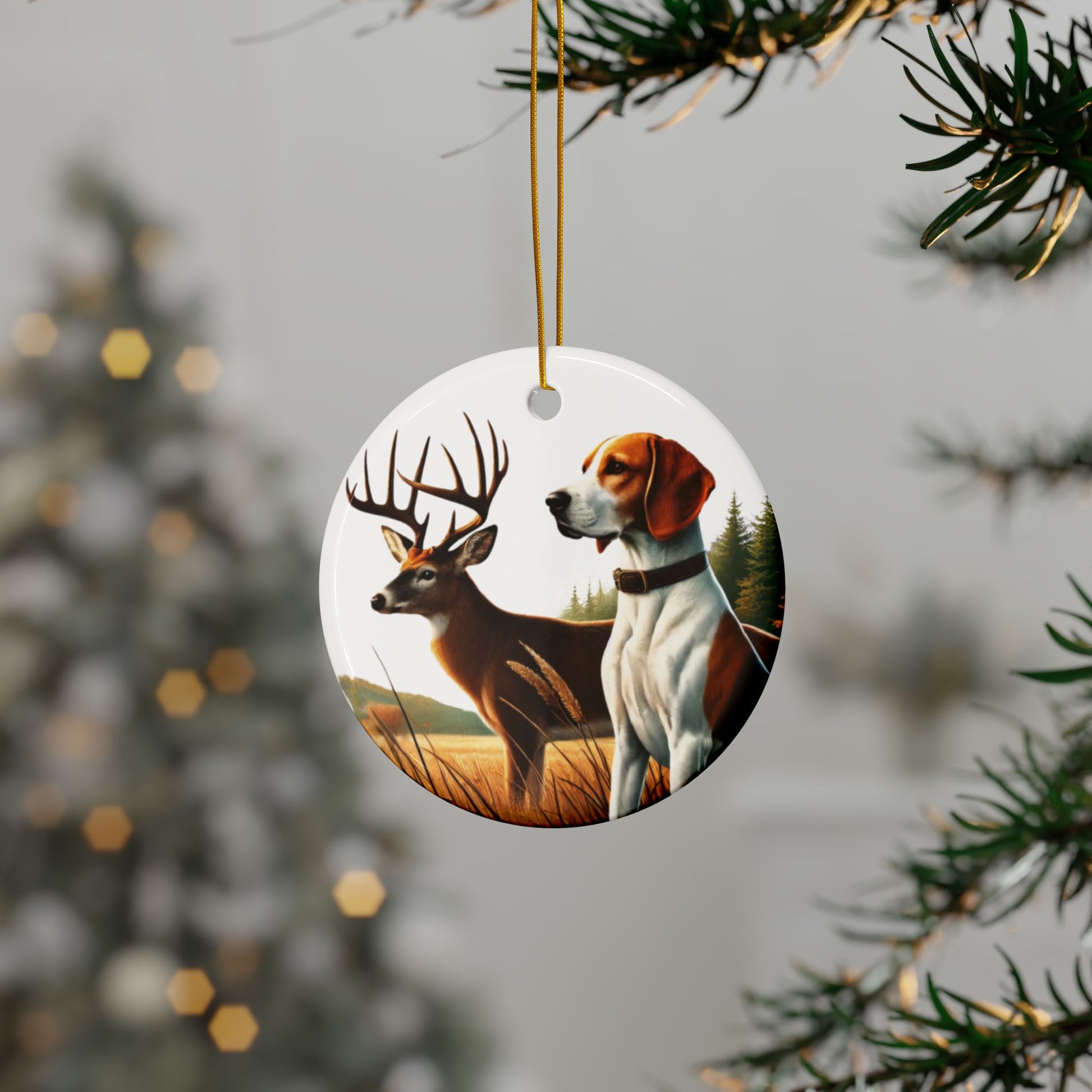 dog and buck ornament hanging from a christmas tree